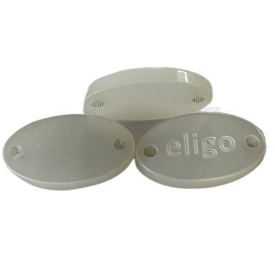 La plastica di immaginazione di ellisse di progettazione del distintivo abbottona il colore del bianco sporco con Logo Sew On Type Custom