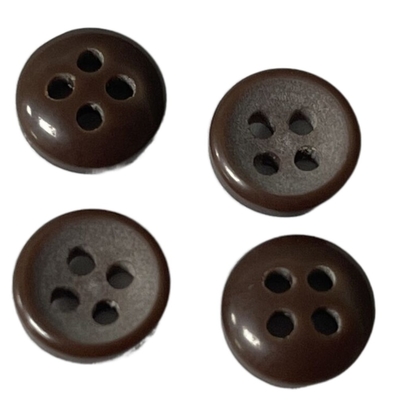 Colore di plastica dei bottoni 4-Holes Brown scuro di immaginazione della resina in 15L per la camicia di cucito